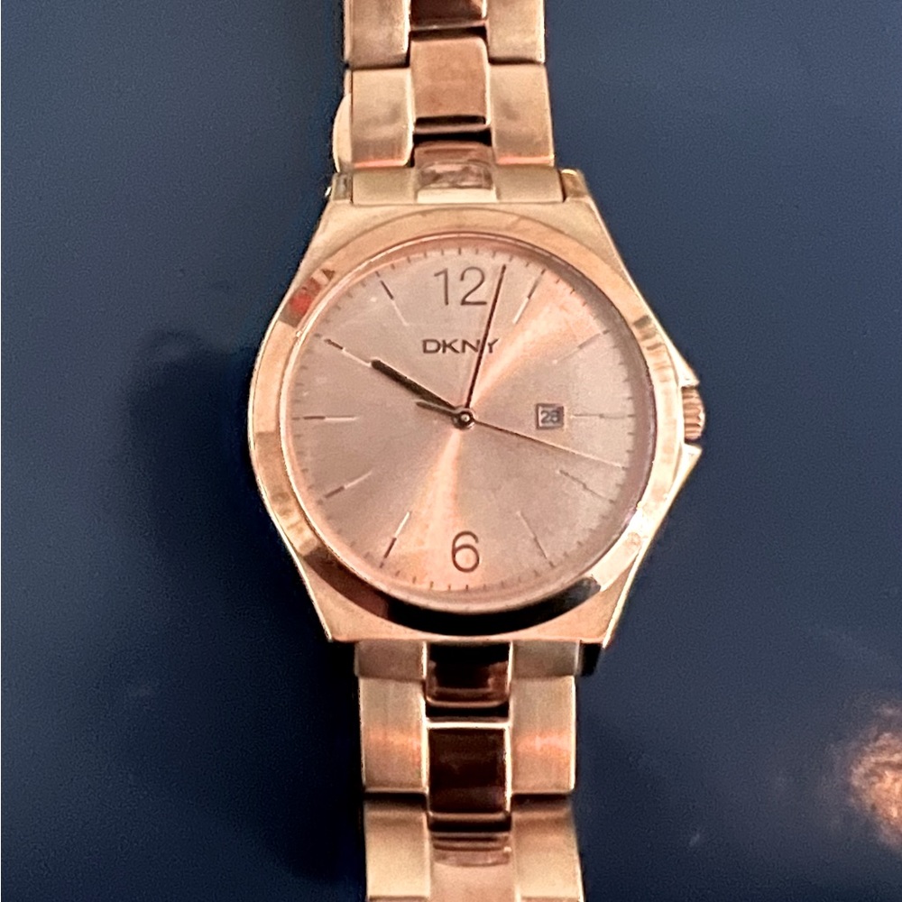 DKNY woman’s gold rose watch